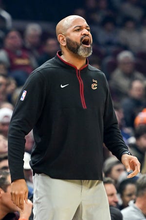 Cleveland Cavaliers head coach J.B. Bickerstaff yells to players during the first half of an NBA basketball game against the Utah Jazz, Monday, Dec. 19, 2022, in Cleveland. (AP Photo/Nick Cammett)