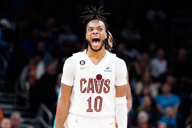 Cleveland Cavaliers' Darius Garland (10) screams as his team takes a 16 point lead over the Phoenix Suns late during the second half of an NBA basketball game in Phoenix, Sunday, Jan. 8, 2023. (AP Photo/Darryl Webb)